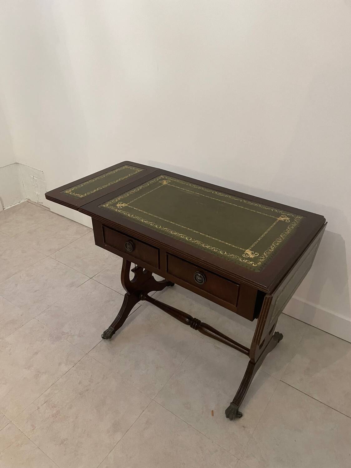 English coffee table with shutters and green leather top