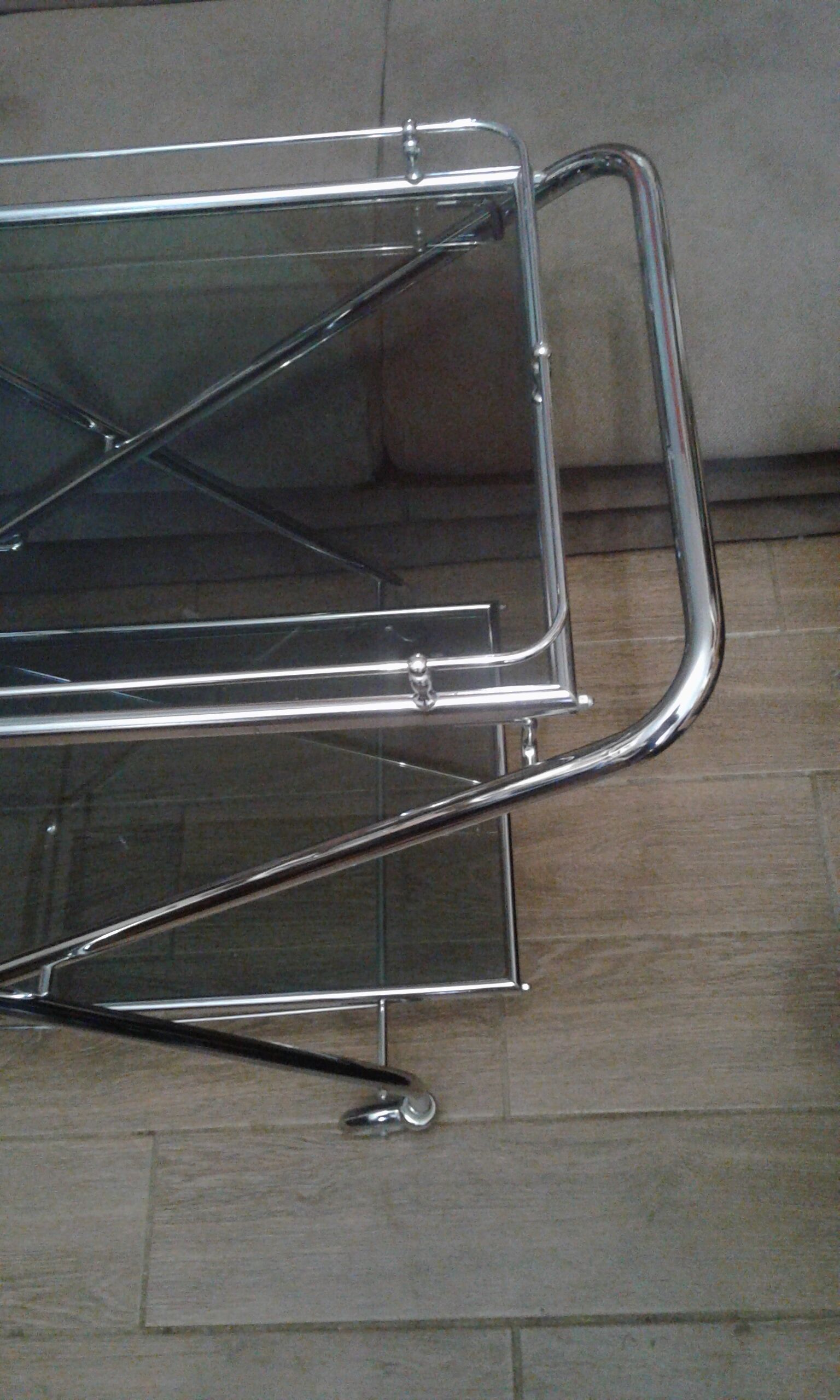 Chrome and smoked glass serving in the year 70