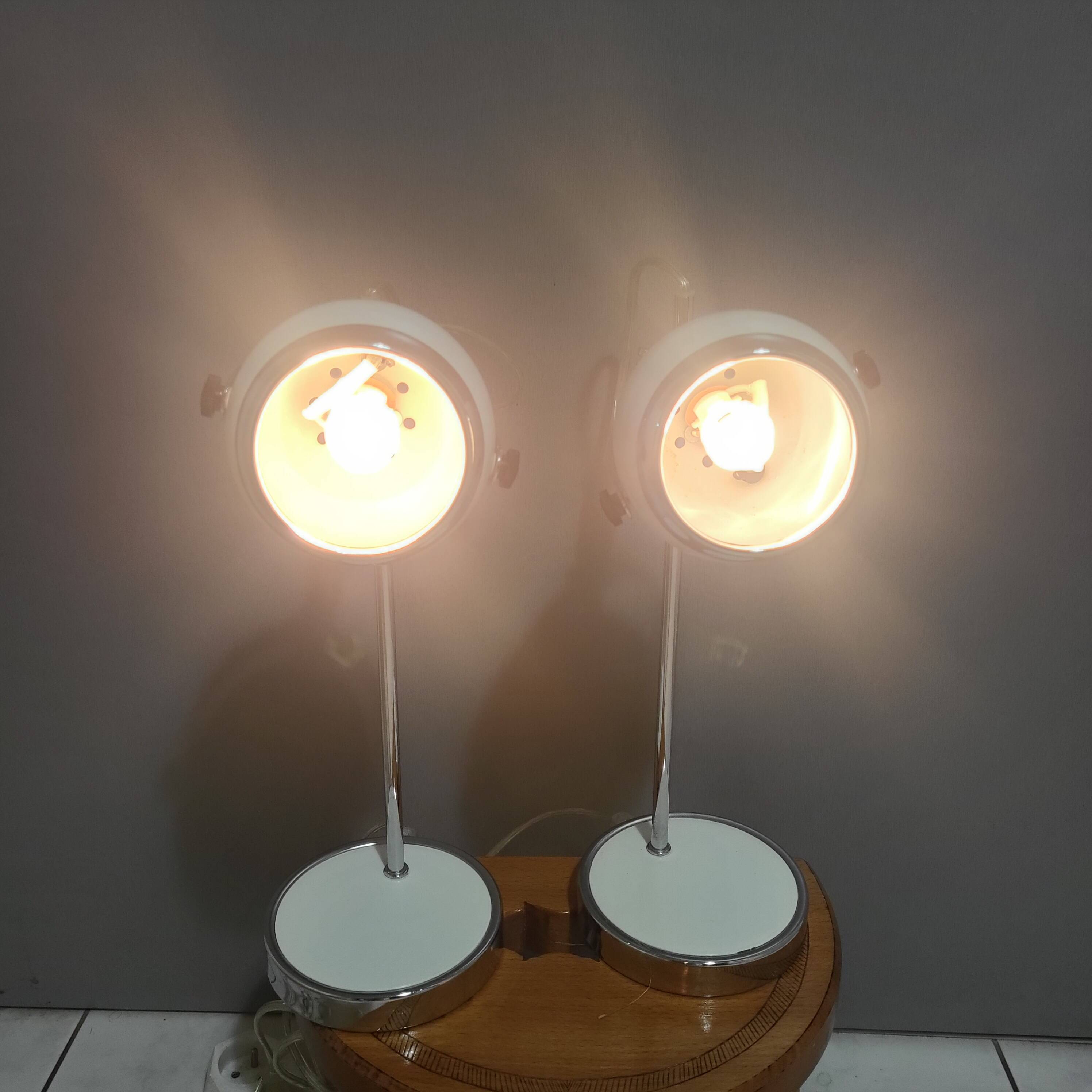 White and chrome metal eye ball lamps