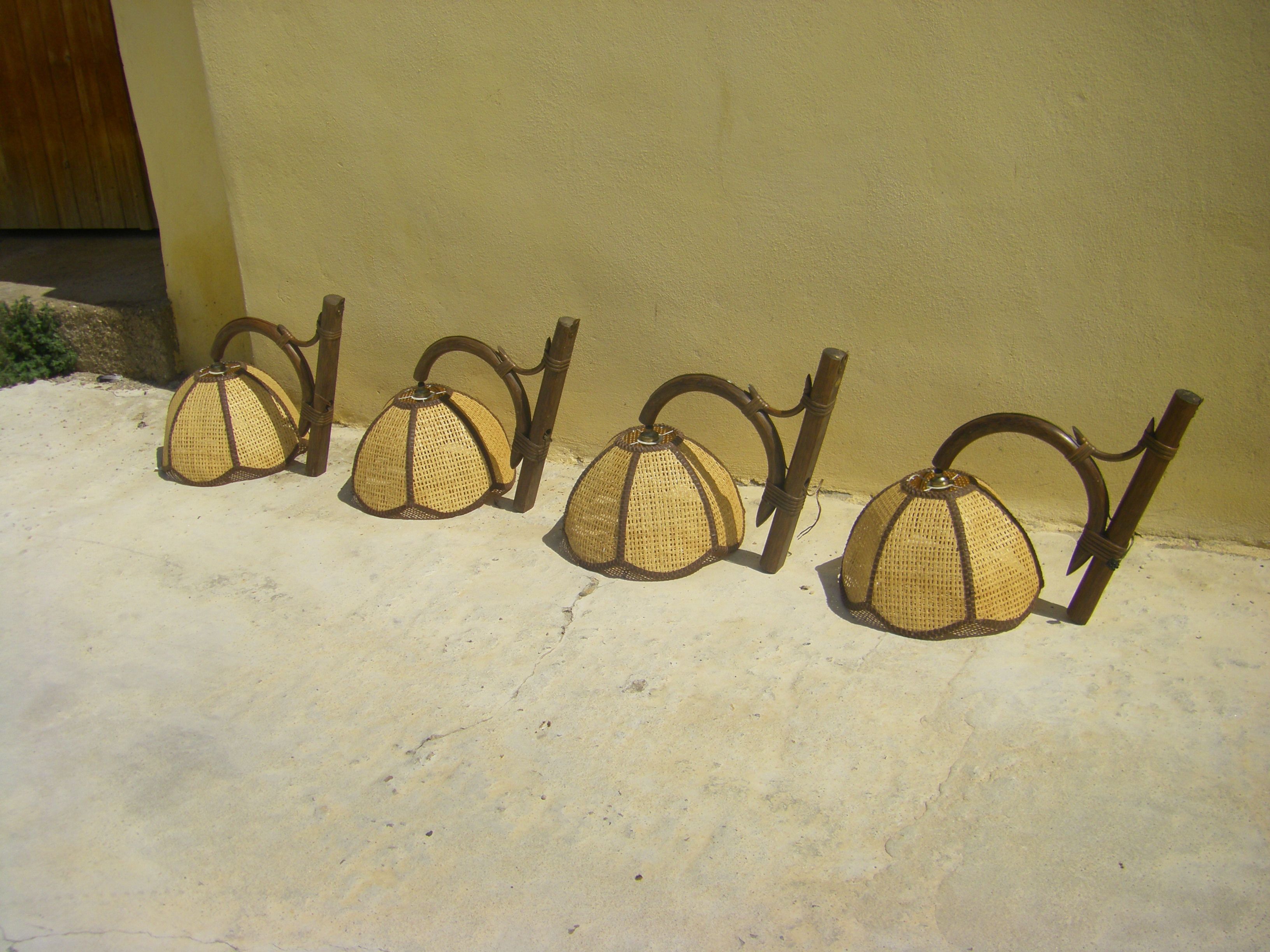 Four vintage rattan wall lamps