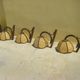 Four vintage rattan wall lamps