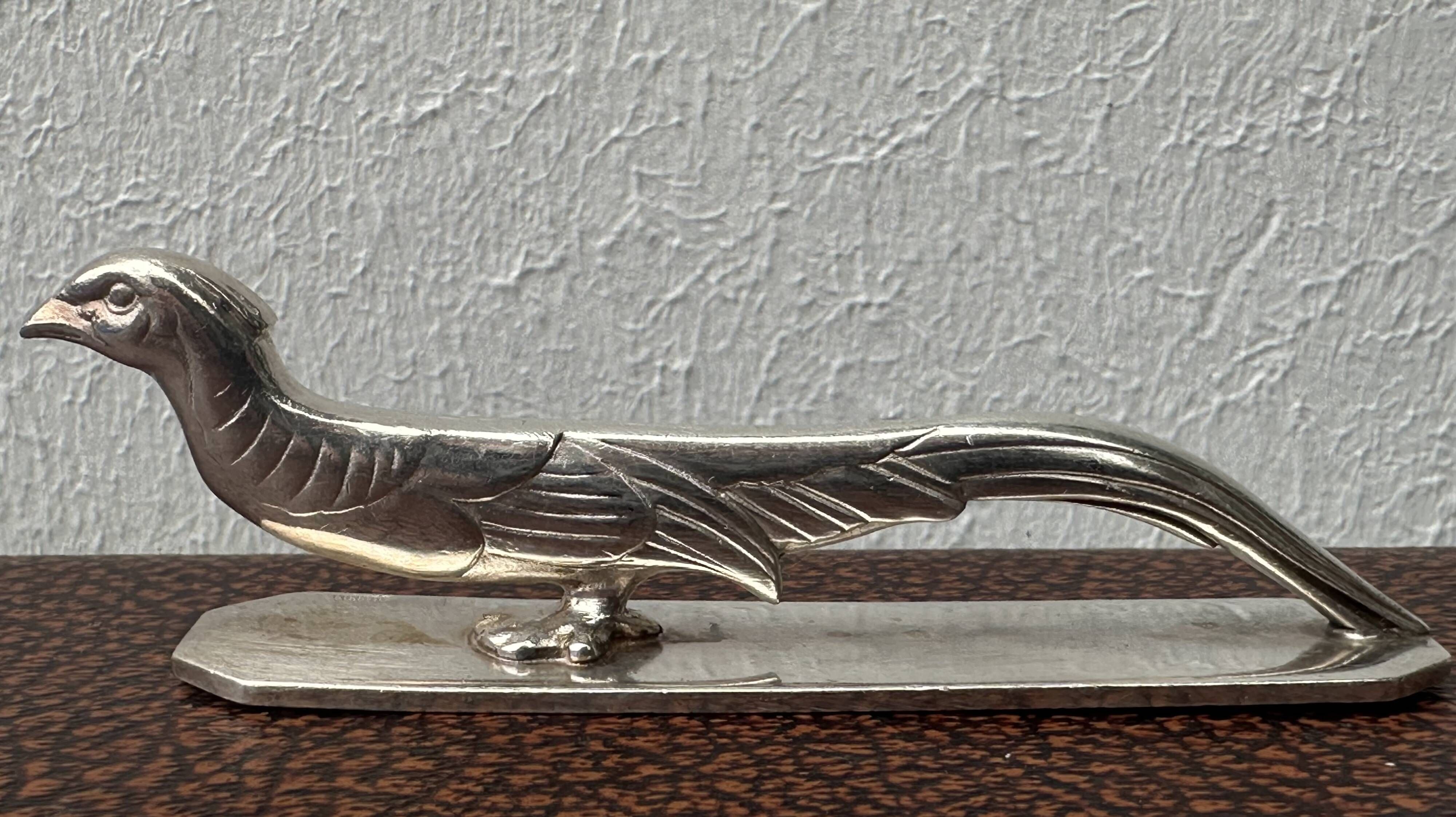 12 antique silver-plated bronze knife rests in modern art deco animal designs.
