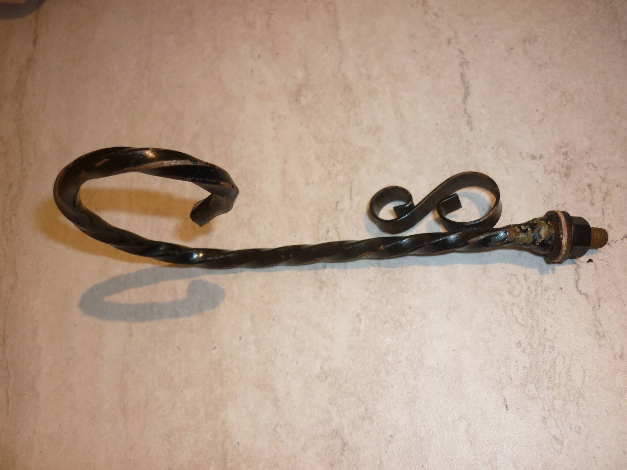 Braided yellow cheese platter and wrought iron