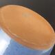 Signed enamelled terracotta bottle vase
