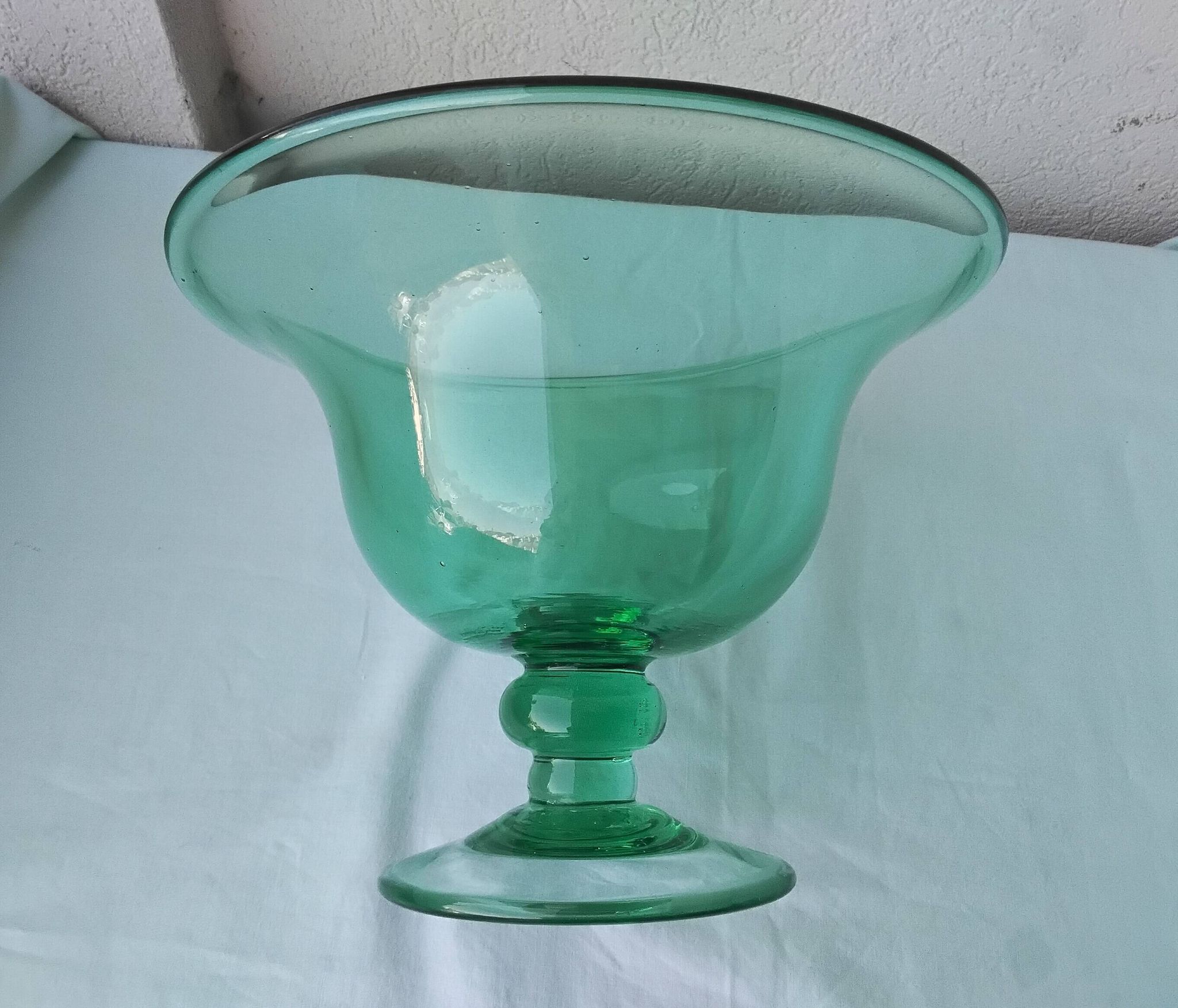 Glass coupe on a stand