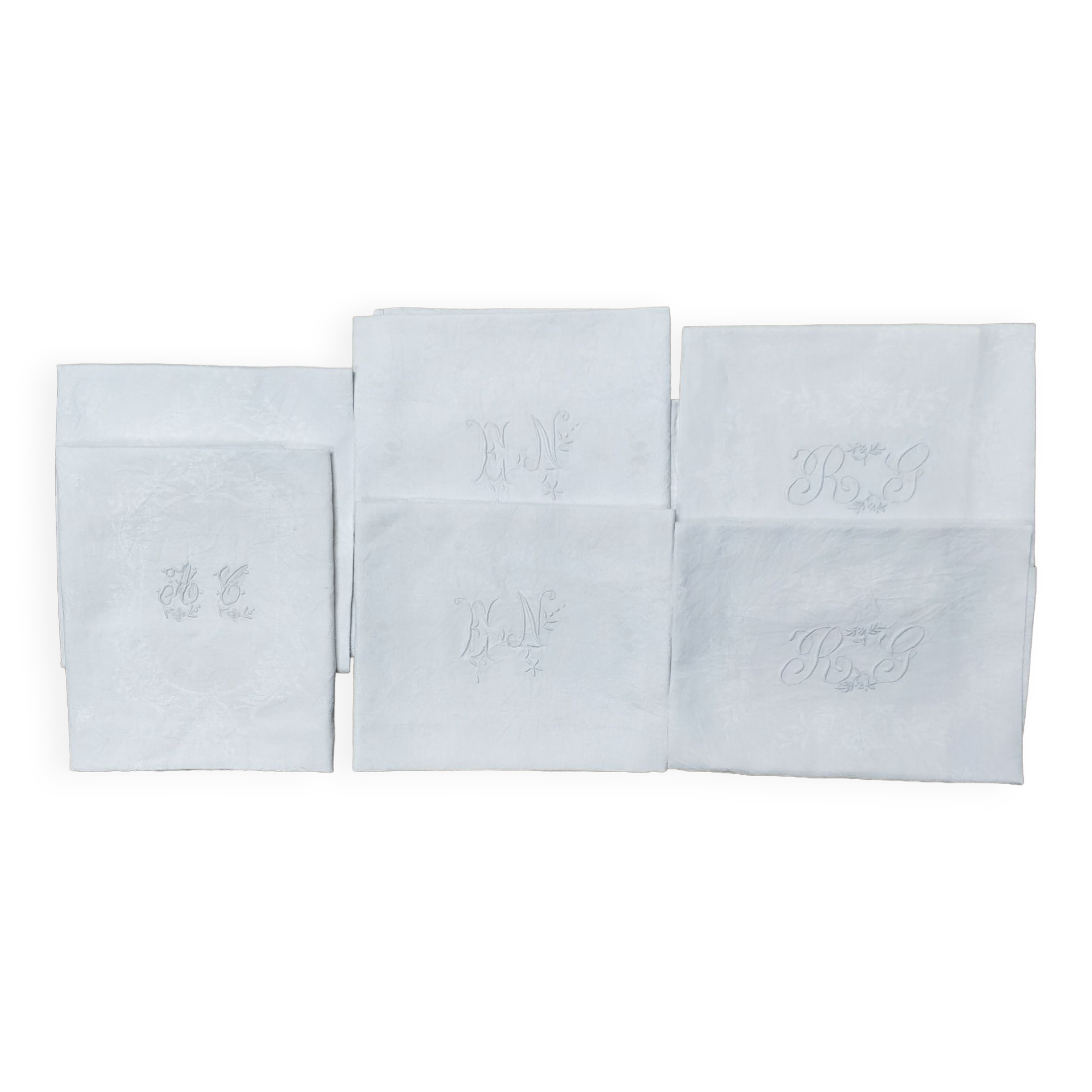 White linen towels embroidered