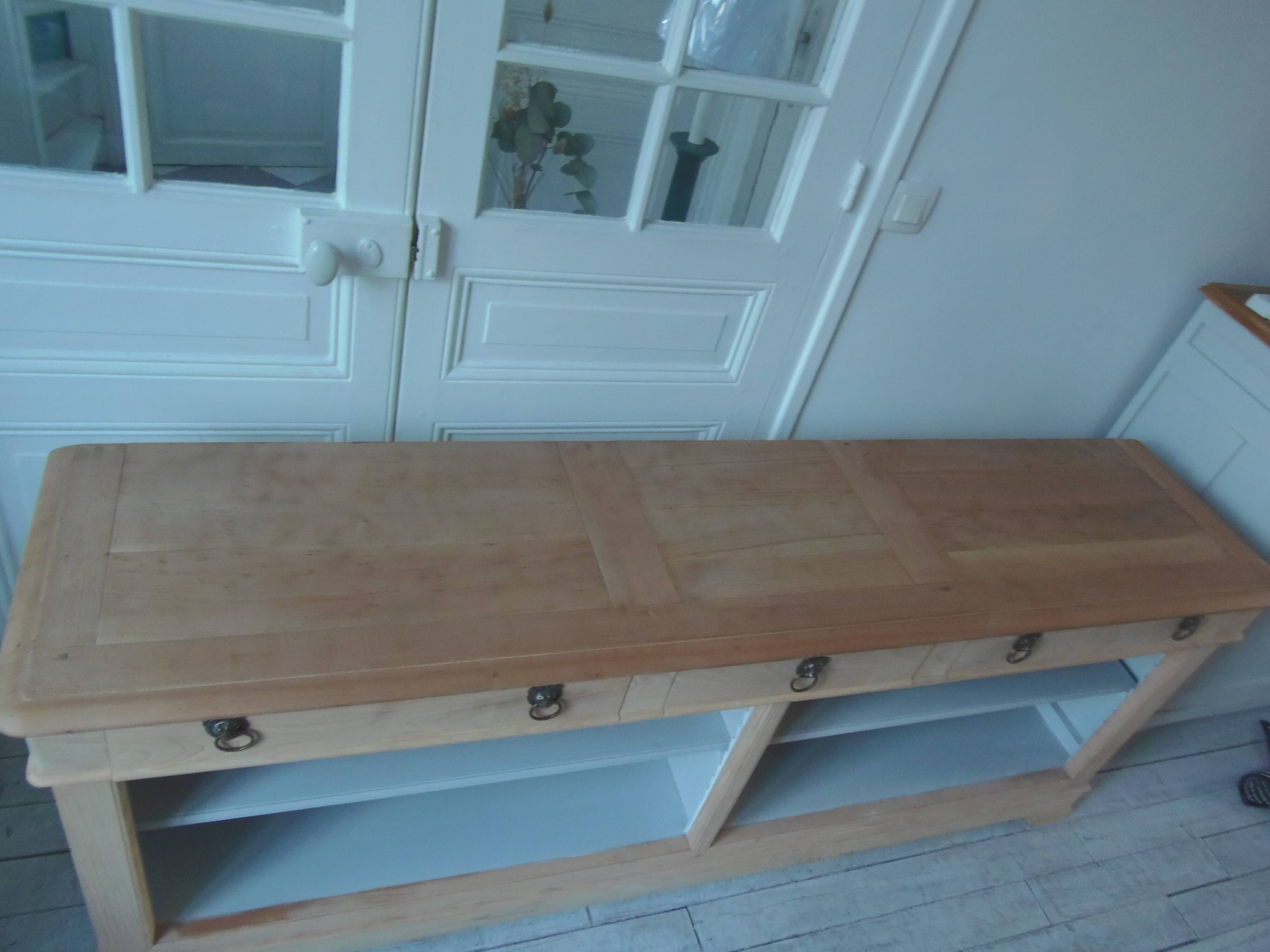 crafted dresser in raw solid wood.