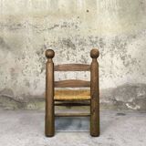 Vintage low chair in wood and straw