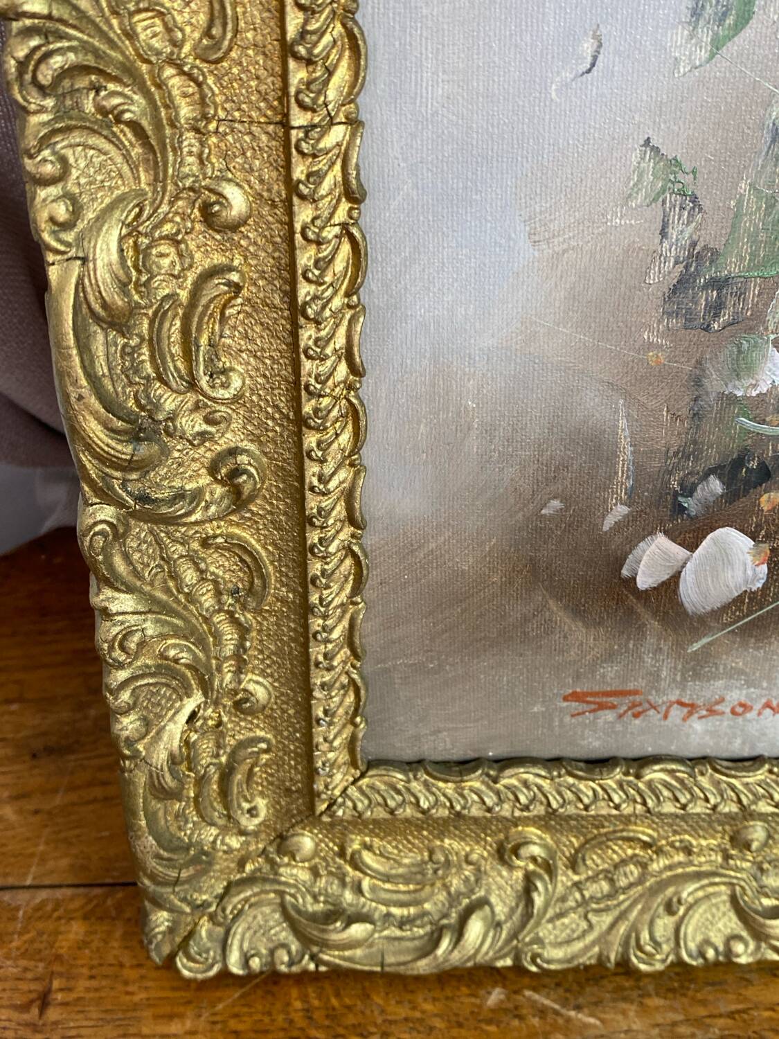 Huile sur toile, décor floral, encadrement en bois doré