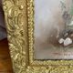 Huile sur toile, décor floral, encadrement en bois doré