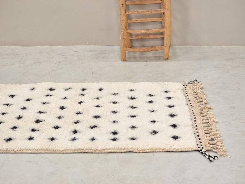Moroccan polka dot hallway, white and brown beni ourain rug, berber design