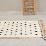 Moroccan polka dot hallway, white and brown beni ourain rug, berber design