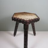 Vintage Spanish stool in carved wood with a leather seat.