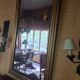 Large Louis Philippe mirror with a gilded wooden frame.