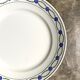 Round dish St Amand in enamelled iron earth white, blue and green