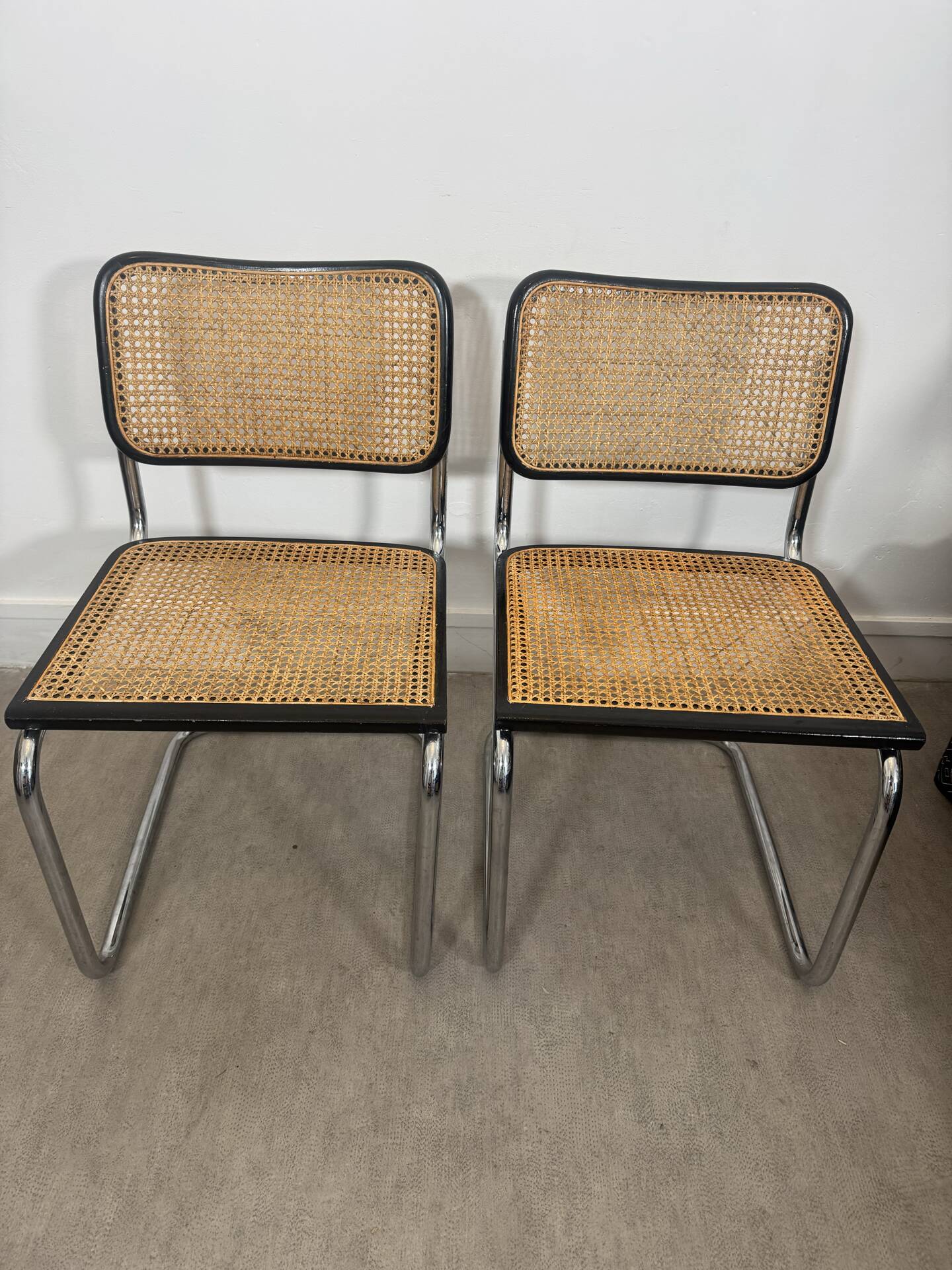 Pair of Marcel Breuer B32 Cesca chairs made in Italy.