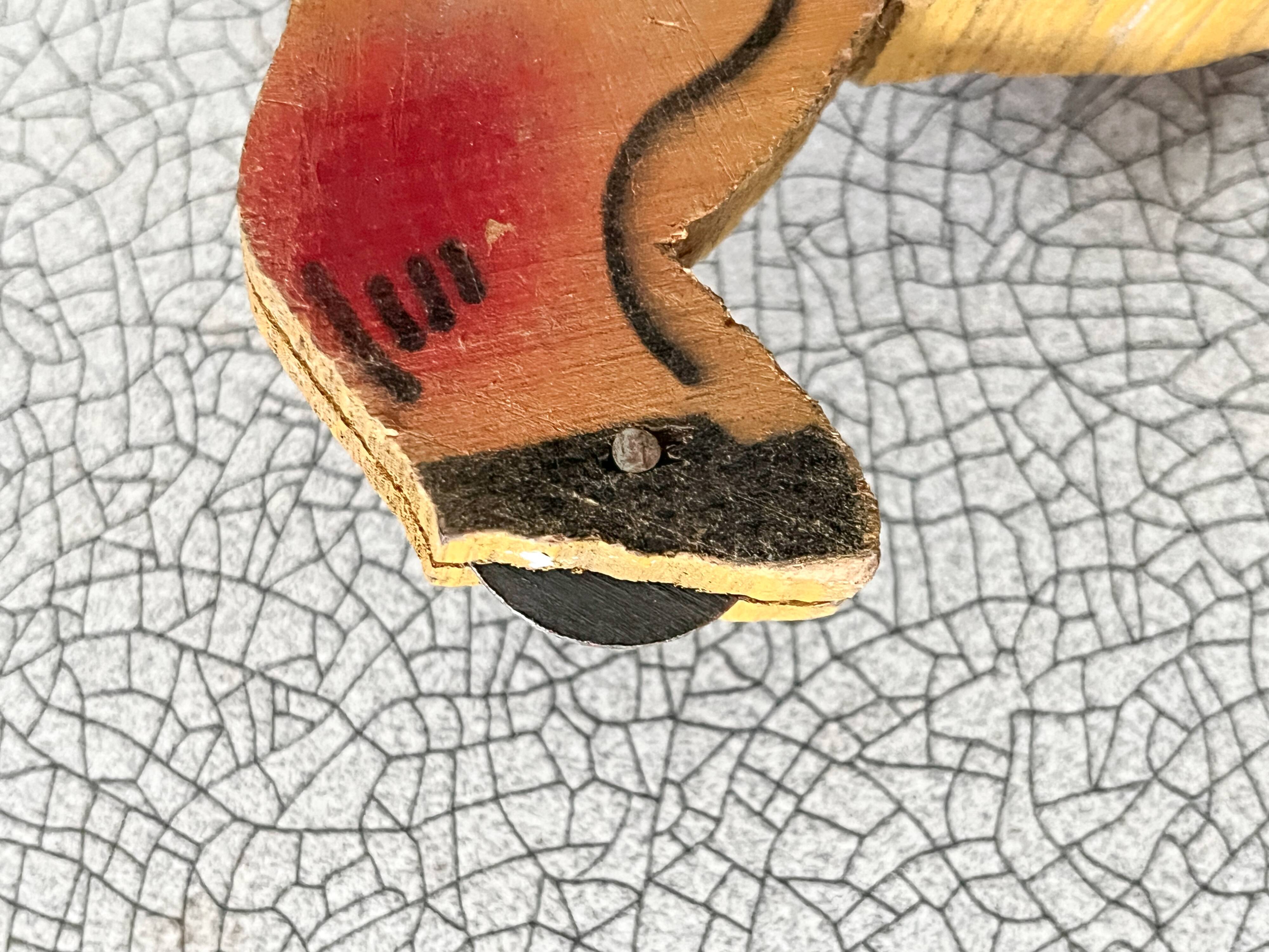 Vintage pull-along toy, horse-drawn with a bell, musical toy