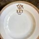 Gold monogrammed porcelain deep plate "F"