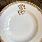 Gold monogrammed porcelain deep plate "F"