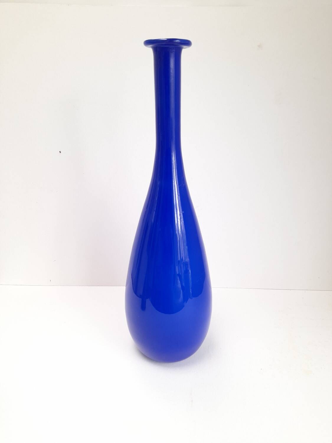 Large bottle vase in bright blue opaline.