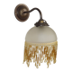 French vintage bronze effect single wall light with opaque beaded glass shade.