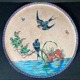 Round polychrome enamel dish with bird decoration circa 1900
