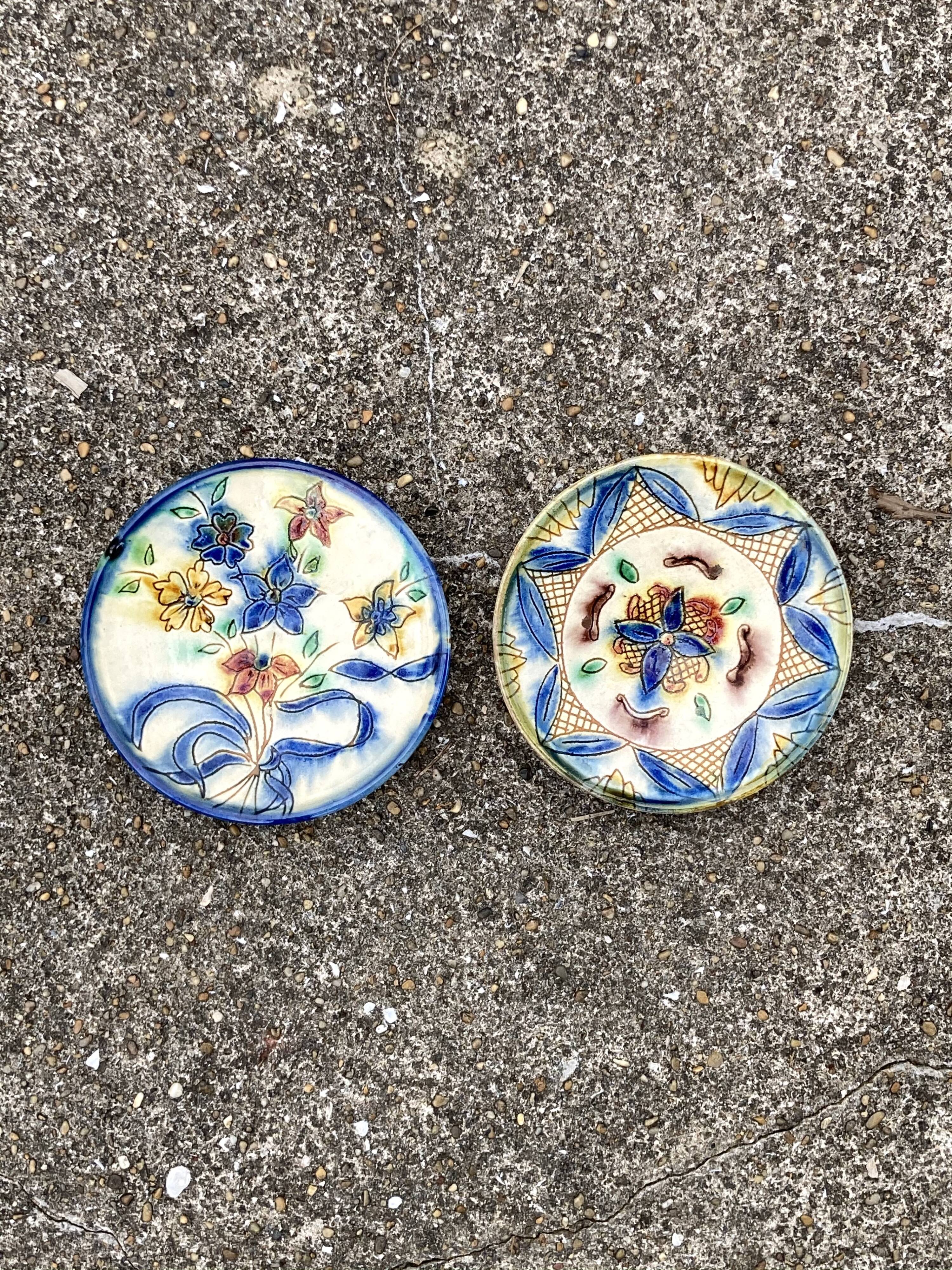 Two artisanal ceramic plates