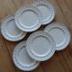 6 vintage dessert plates stamped Longchamp with floral border