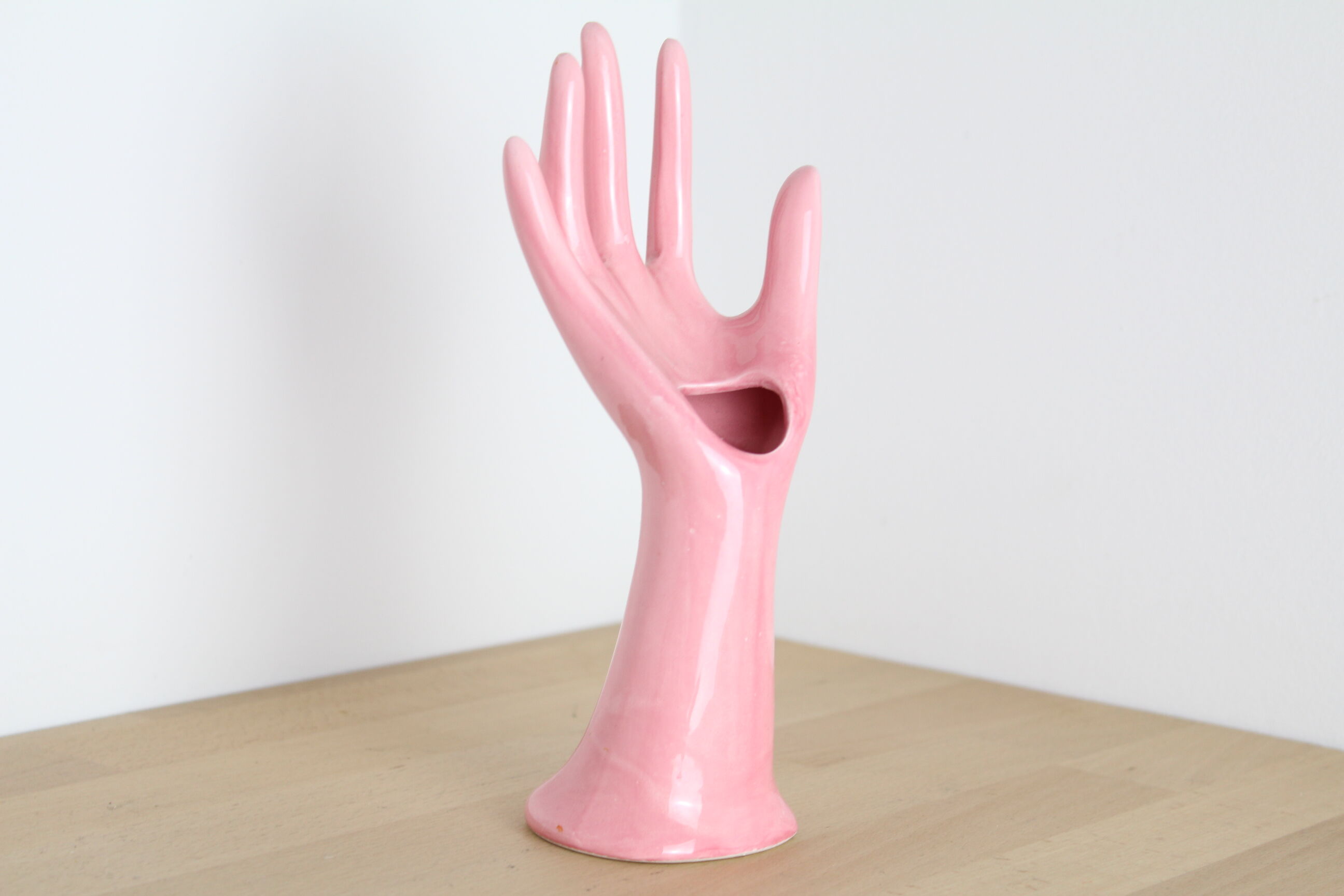 Hand pink ceramic ring sizer doilies