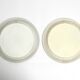 Pair of Mid Century wall mirrors with brass rim and white metal frames