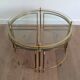 Round brass coffee table in neoclassical style