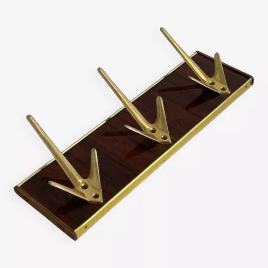 Coat rack or wall hook from the 1950s in wood and brass.