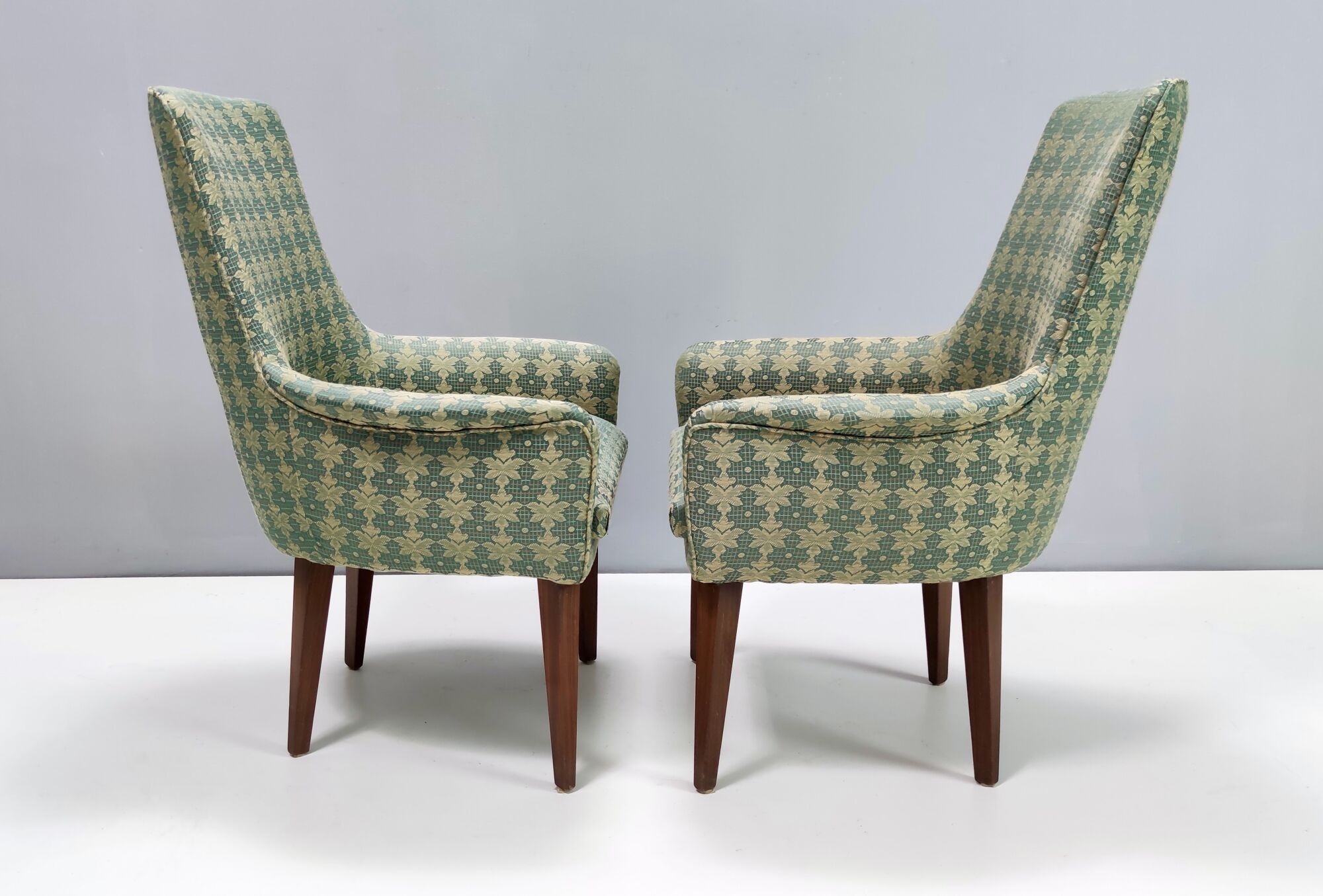 Green fabric and beech armchairs, italy