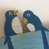 Coat rack with vintage swallows