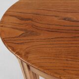 Timeless French Art Deco carved oval side table in oak, 1930s