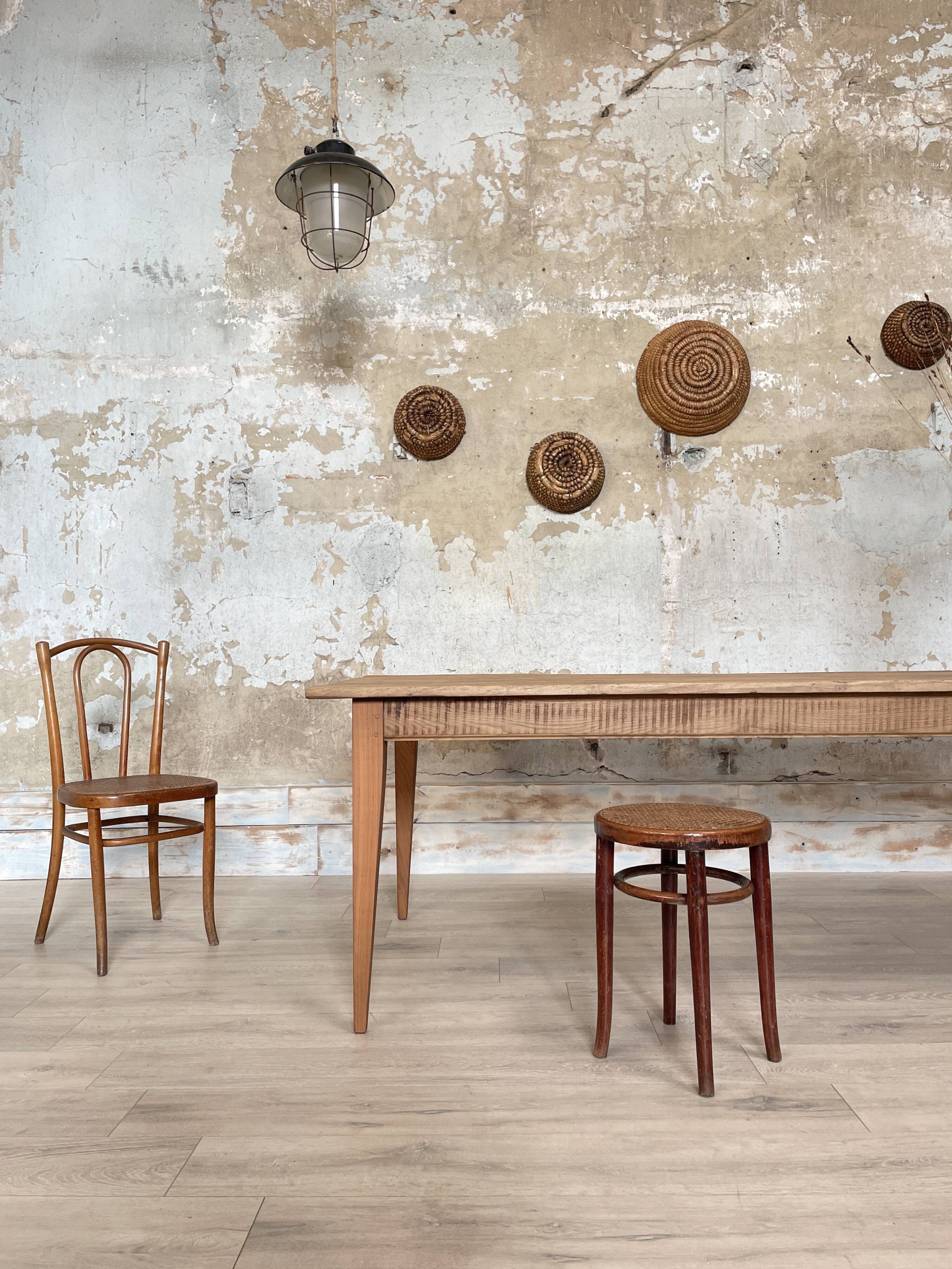 Vintage farm table with spindle legs.