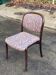 Scandinavian chair in curved solid teak wood and fabric.