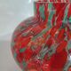 Old multi-colored glass flower vase
