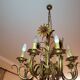 Set of painted metal chandeliers with flower decor