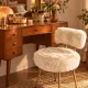 Vintage 1960s dressing table chair with faux fur and golden legs.