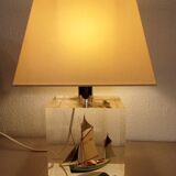 Boat lamp integrated into the base