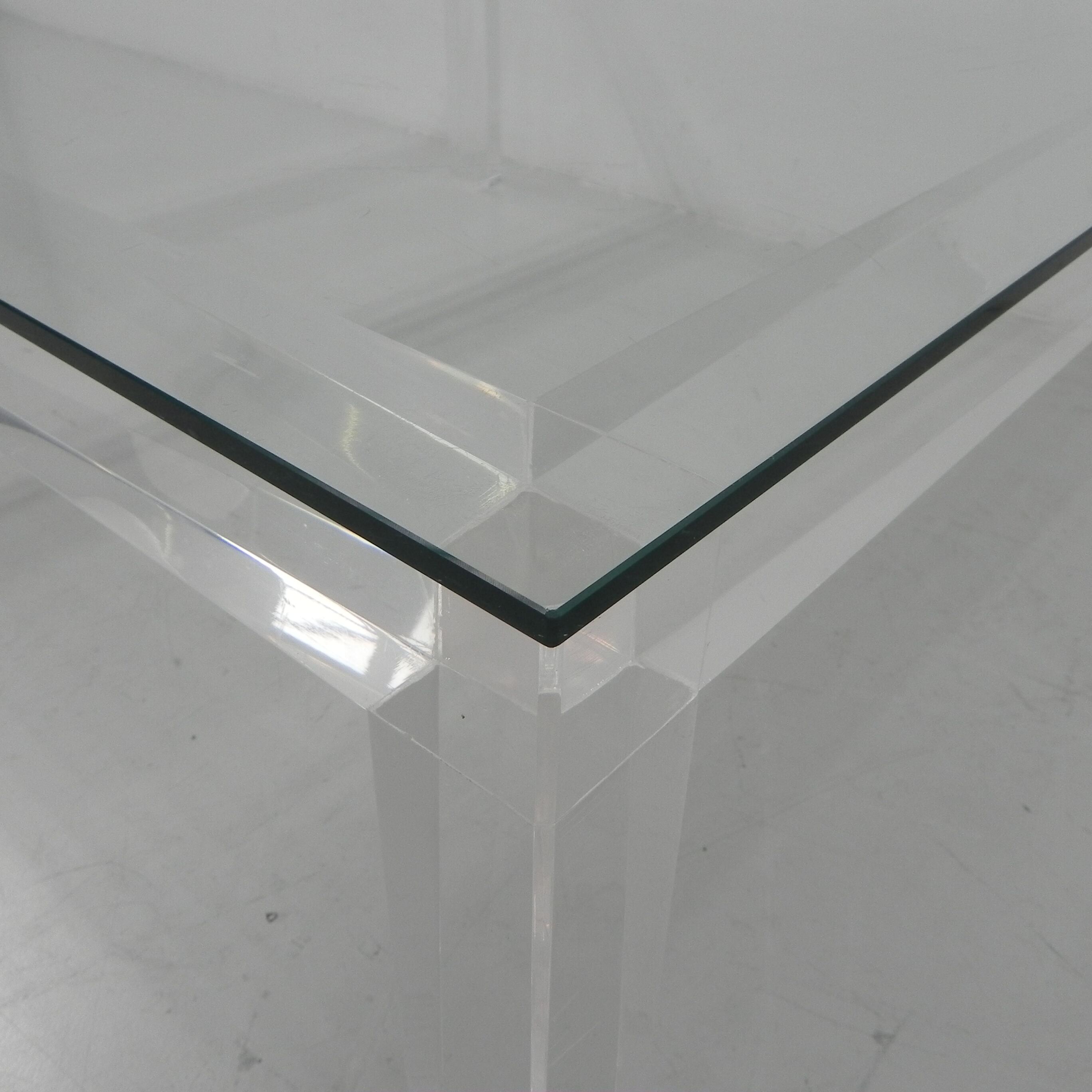 Vintage coffee table on perspex legs