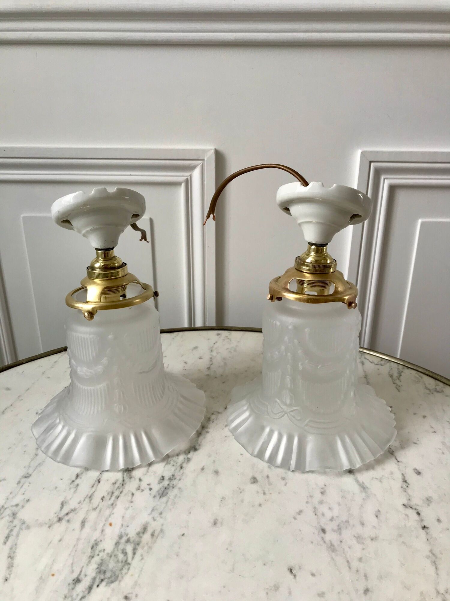 Pair of tulip wall lamps in molded glass on porcelain support 20s