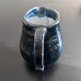 Handcrafted midnight blue pitcher signed