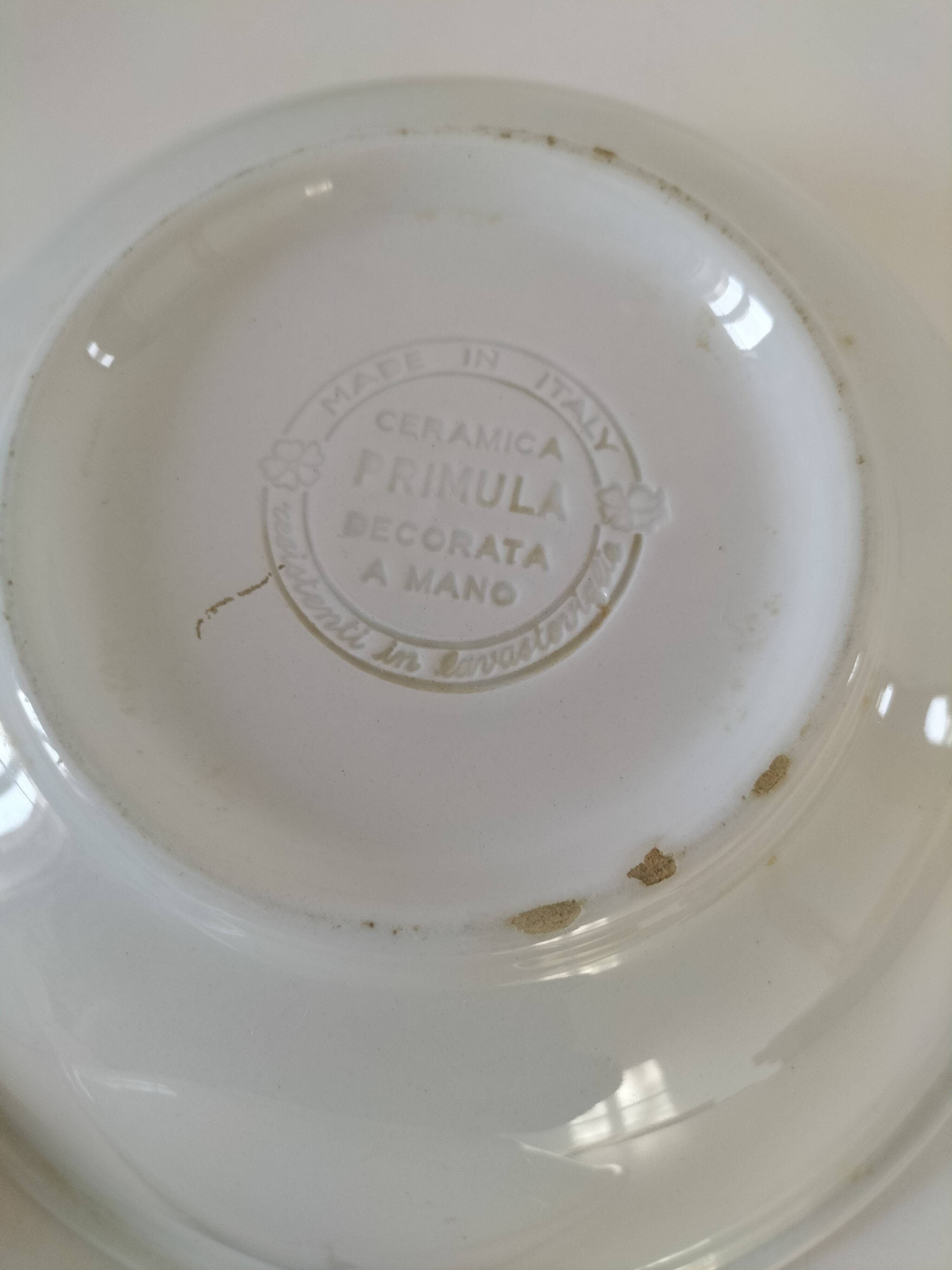 Trio of Italian 1970s deep plates, ochre brown floral decoration