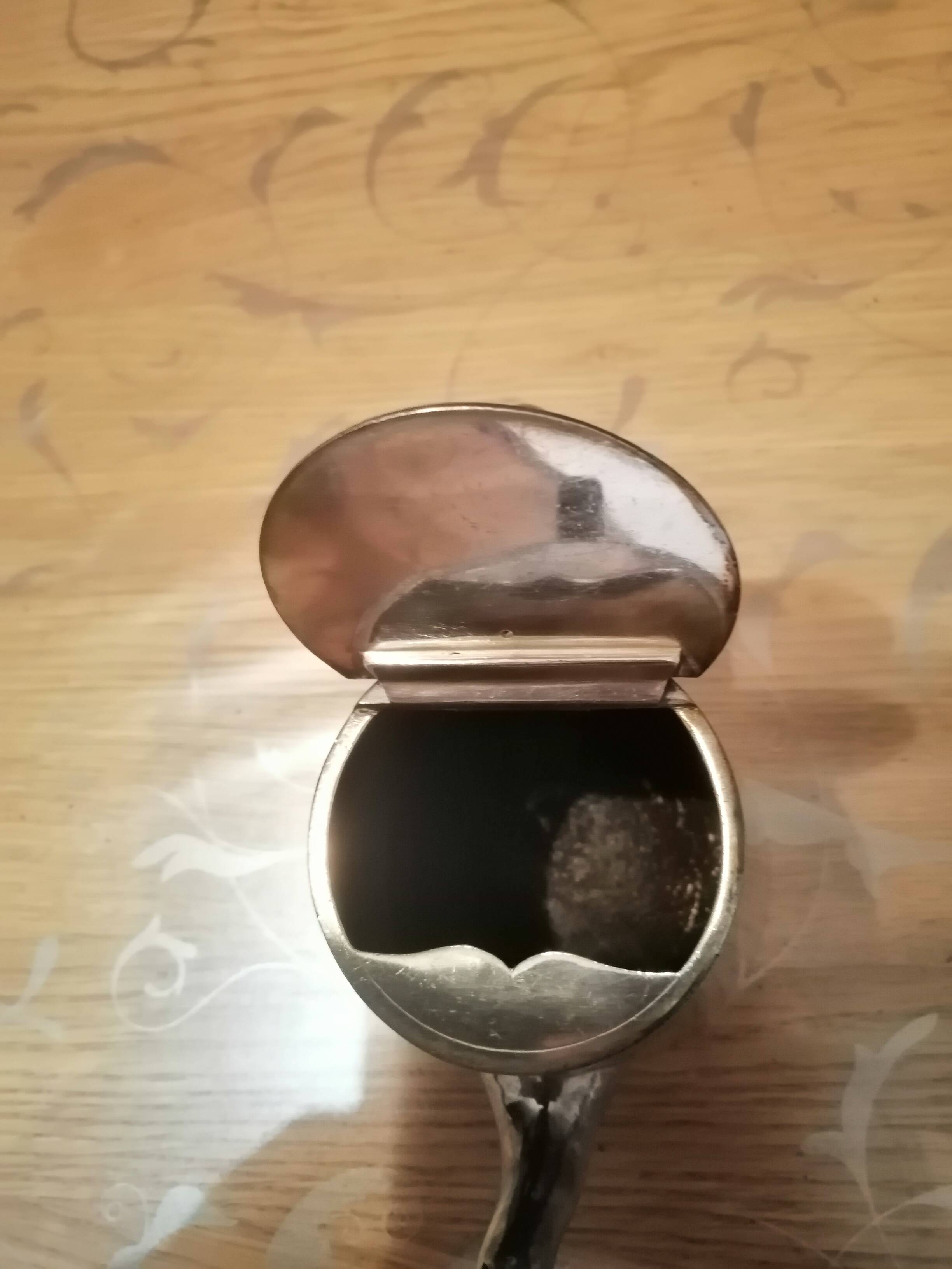 small silver-plated teapot