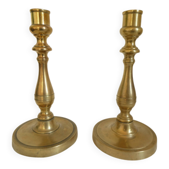 Paire de chandeliers flambeaux en bronze d'époque restauration circa 1820