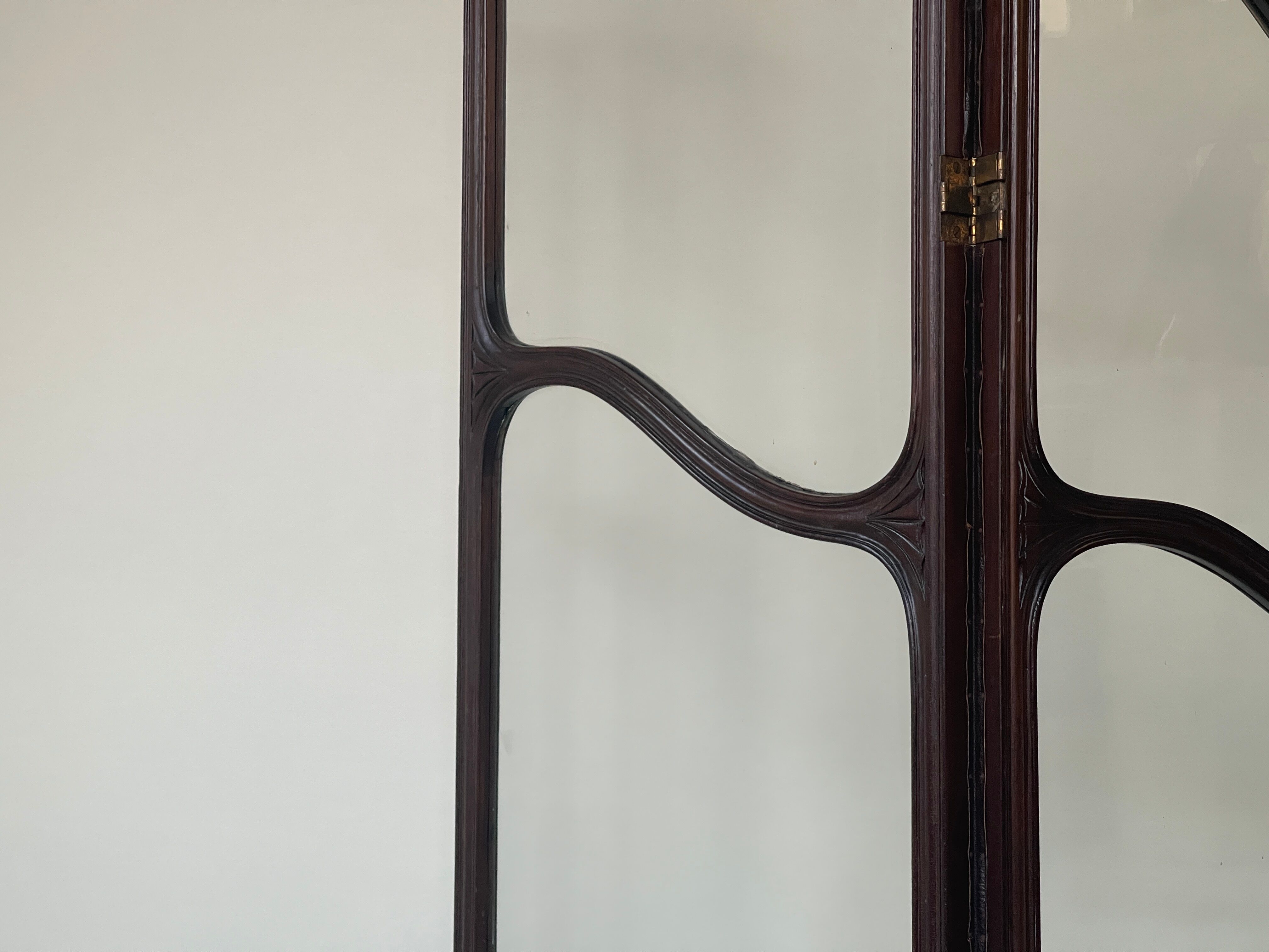 Art nouveau mahogany and glass concertina screen