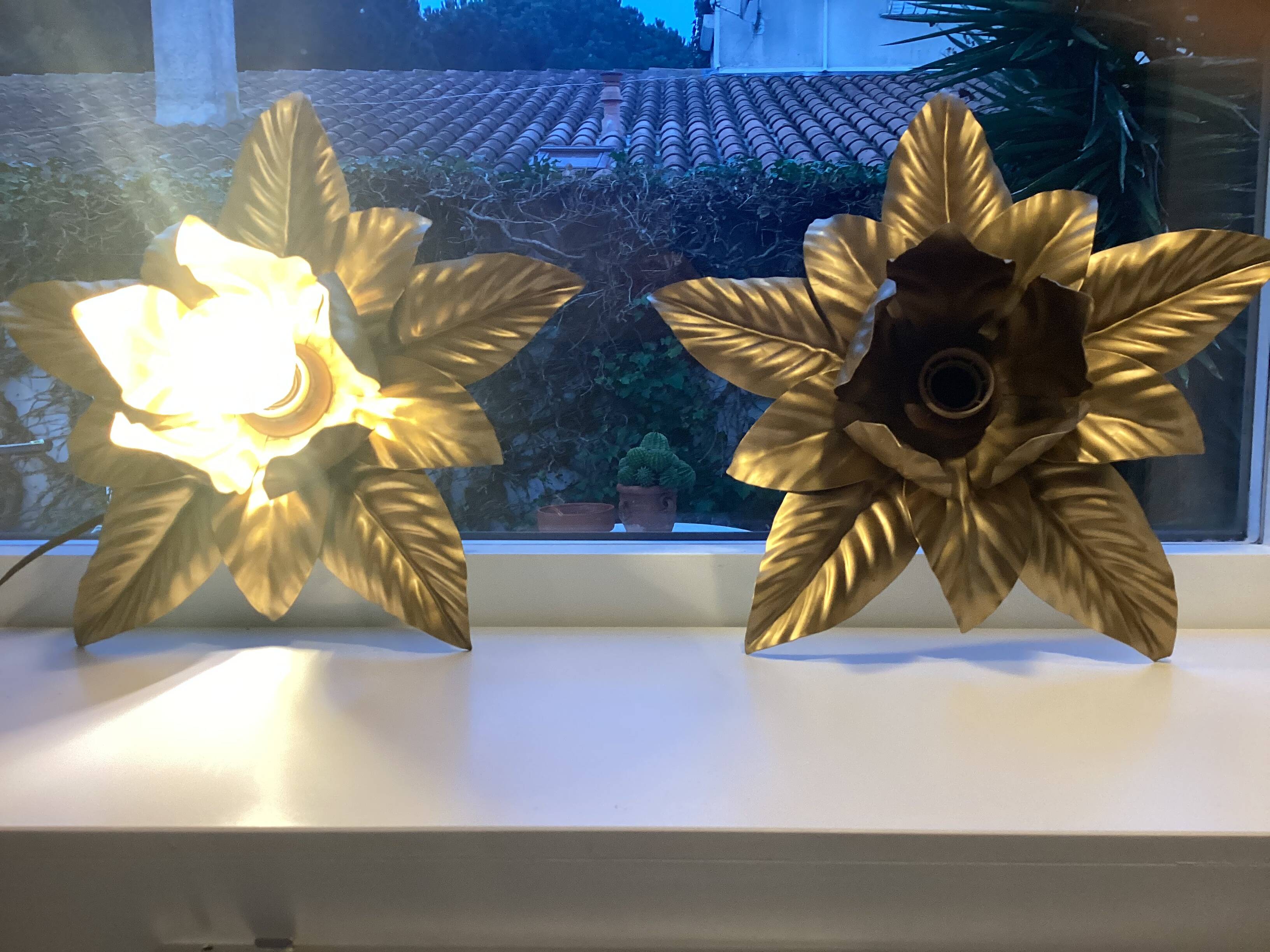 2 golden flower wall lights