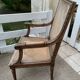 Wooden armchair with caning in Louis XVI style